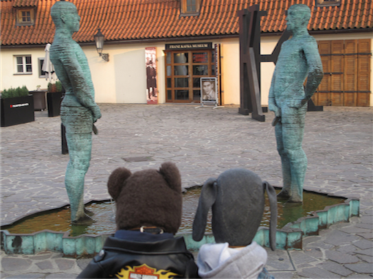 Peeing statues